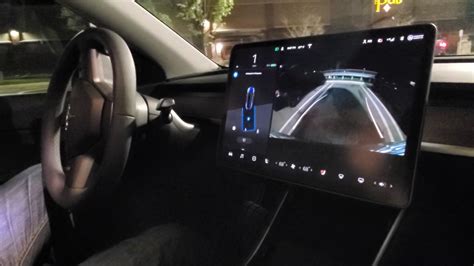 Touch the button located in the upper left corner of the Camera app screen. . Park assist chimes tesla model y